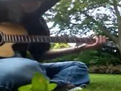 Playing Guitar In My Garden 