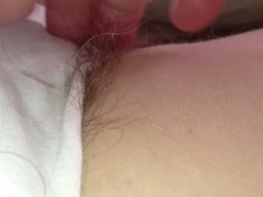 long pubic hair escaping from the sides of her white pantys