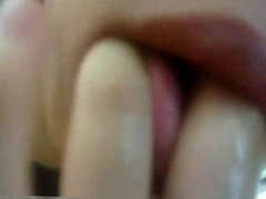 Girl squirts and licks her fingers