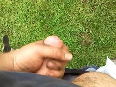 uncut cock jerks off outside