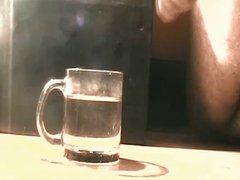 Cum in a glass of water