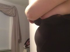 changing into her black girdle, big natural soft tits.