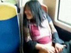 Asian girl masturbating on a public train