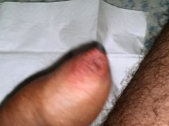 Cumshot without hand, watching a porno - tight foreskin