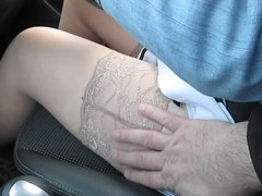 Touching her legs in stockings while she driving car
