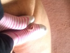 Girlfriend with socked feet plays with my tiny dick