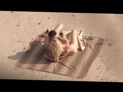 Voyeur on public beach. Hot young couple sex1