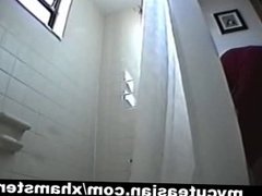 Hidden cam footage of a hottie showering
