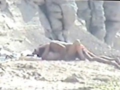 Shy couple caught on the nudist beach