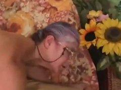 Granny gives a Blowjob to a Guy
