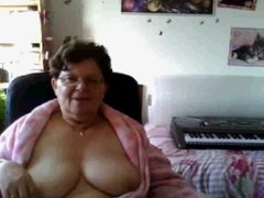 naughty granny flashing her big tits on cam