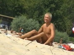 This teen nudist strips bare at a public beach