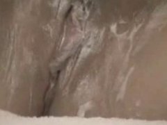 Mod housewife strips down and shaves her pussy