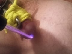 Torture his cock and balls with a violet wand.