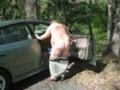 Chubby daddy stripping outside his car