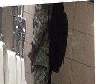 black military showing in restroom