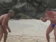 bodybuilders on beach