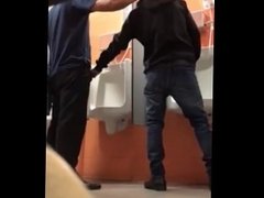 Twink tries to suck a stranger in public toilet but people came in!