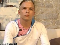 'British twink Shay jerks off big cock after hot interview'