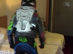 Ficht in motocross gear over who is going to be the bottom