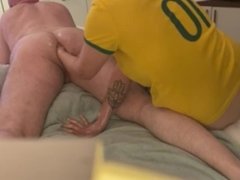 Brazilian Wife Fisting her Husband while he is gaming