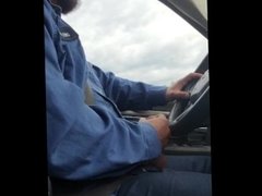 Blue collar worker jerks driving to work