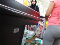sexy girl in spandex at the grocery