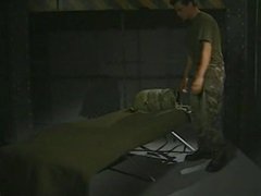 Military dude playing with his foot and cock