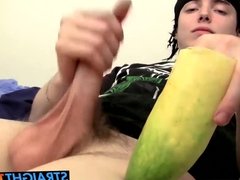 Straight tattooed thug playing with his big cock and a fruit