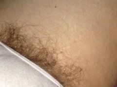 her bulging hairy pussy and soft boob.