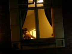 Naked in Hotel window