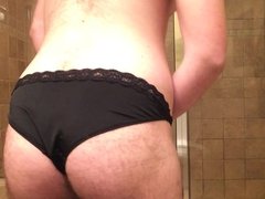Boy showing off and playing in panties