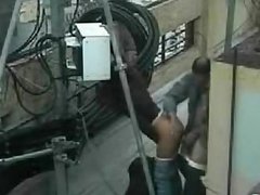 Security camera records rooftop quickie