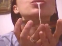 Teen eats her juices with a spoon