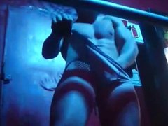 Hot man dancing naked in a night club