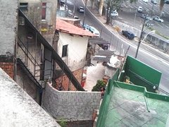 Batendo uma punheta na janela e vizinha vendo