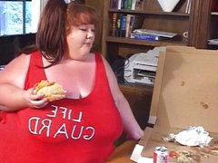 Fat lifeguard bitches eat food on the beach