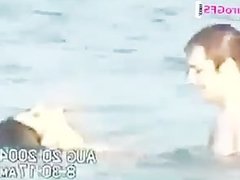 Gabriella fucks a guy in the water