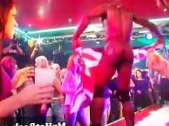 Several girls stand in awe as a black male dancer