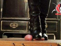 Domme Boots Trample slave's cock One