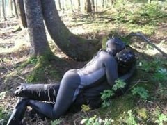 In a fantasy scene a frogman humps a dummy villain in the forest