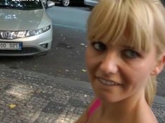 Girl with piercing blows a huge cock in the alley