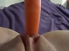 Hot Teen play's with a Carrot