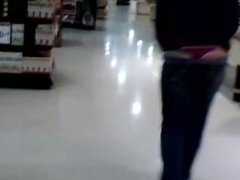 Maddie Walks Through Busy Store With Thong Hanging Out