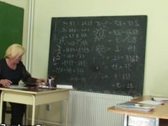 Very old teacher is pounded by two boys