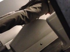 Spy pissing in restroom