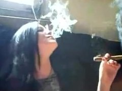 Eva smoking a Churchill Cigar