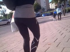 Incredible milf with bubble butt in black leggings and heels walking 2