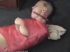 Topless Mummified Girl Gets Tickled on her Feet