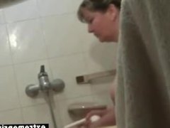 Mature housewife Mia spied in the bathroom